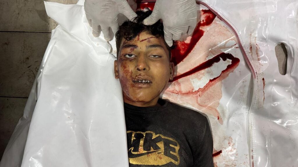 Shahidan unknown identity in the morgue of the Nasser Medical Complex in Khan Yunis.
