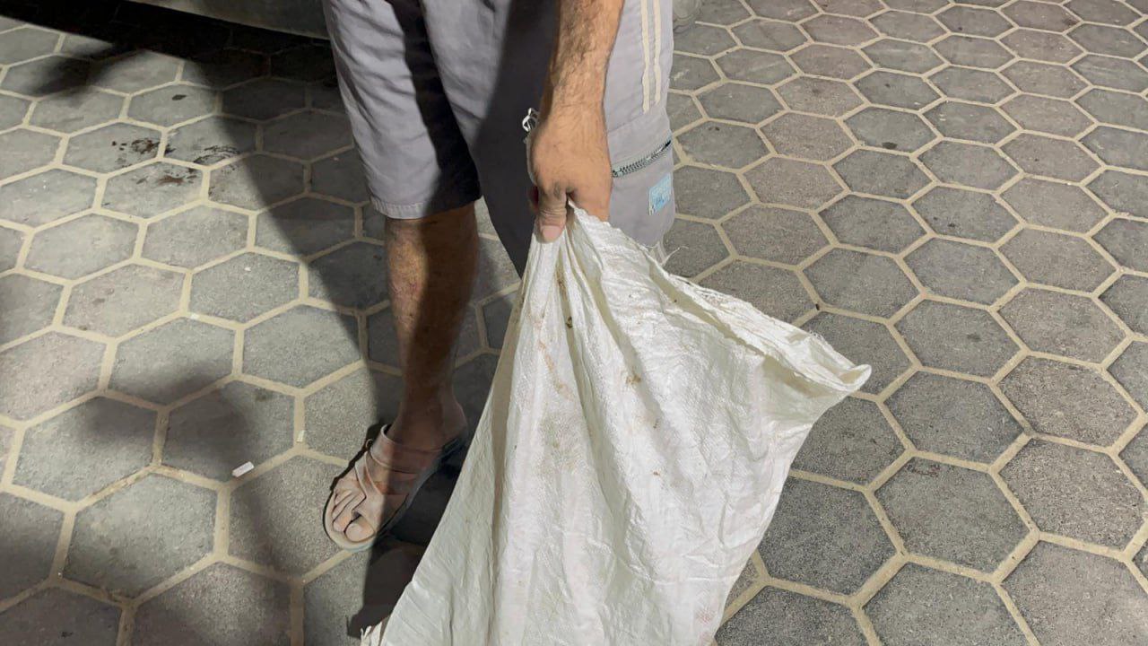 المل The shade of a martyr was placed in a flour bag from targeting the Al -Jaddi family home in Al