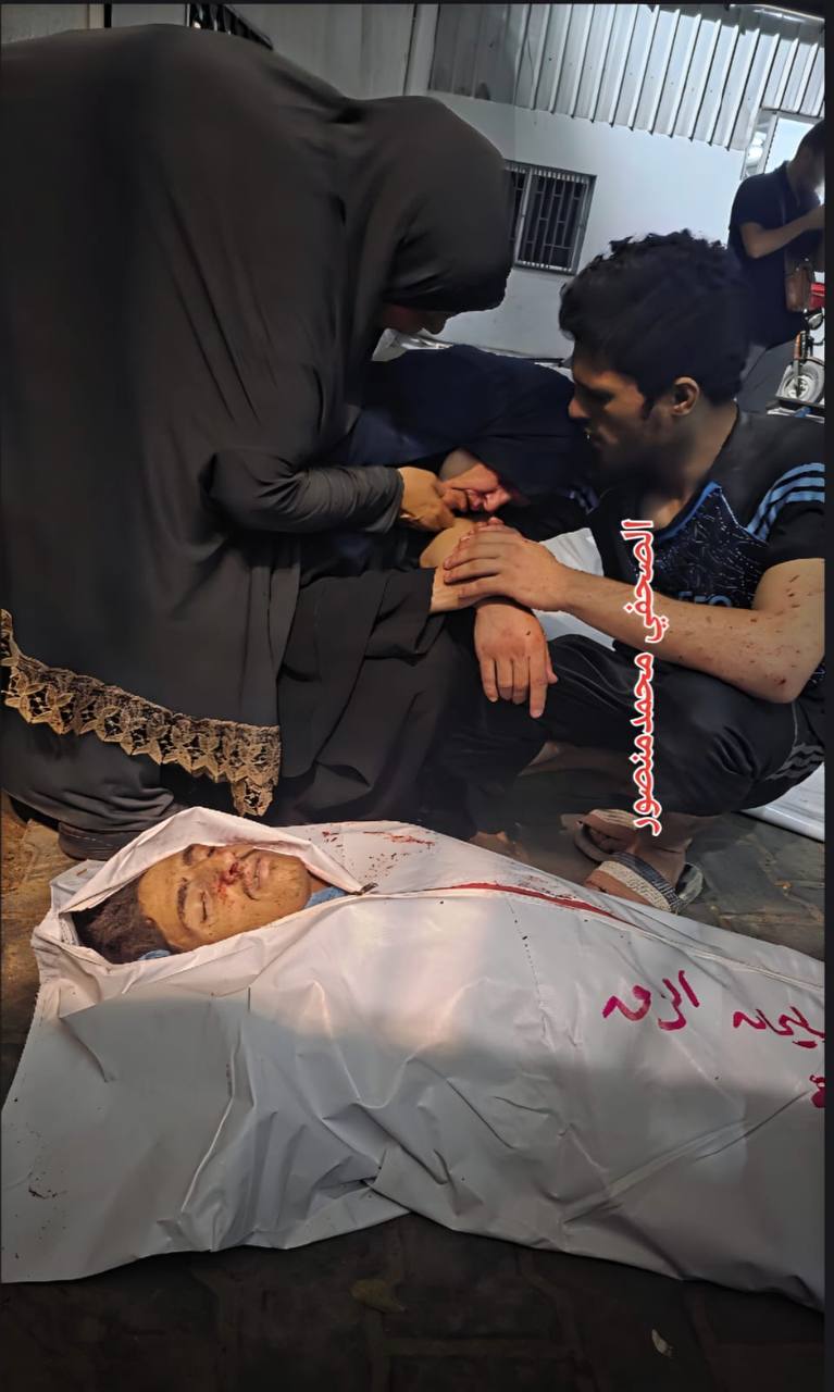 __ Bares covered by oppression _ ... the liberated prisoner Fatima Al -Zaq, who gave birth to her so