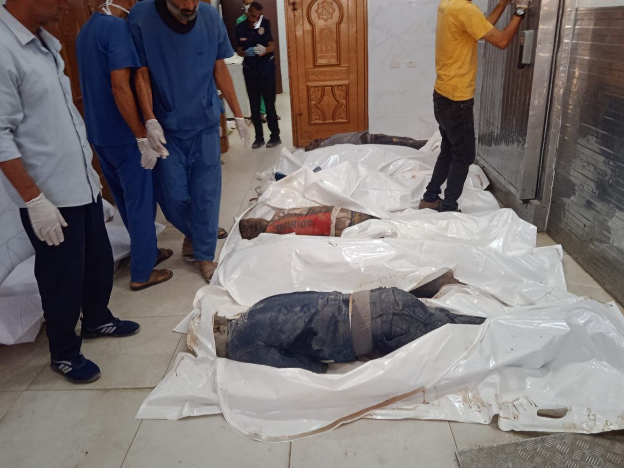 Follow -up - Civil Defense Pictures of the bodies of the martyrs who were recovered by our crews fro