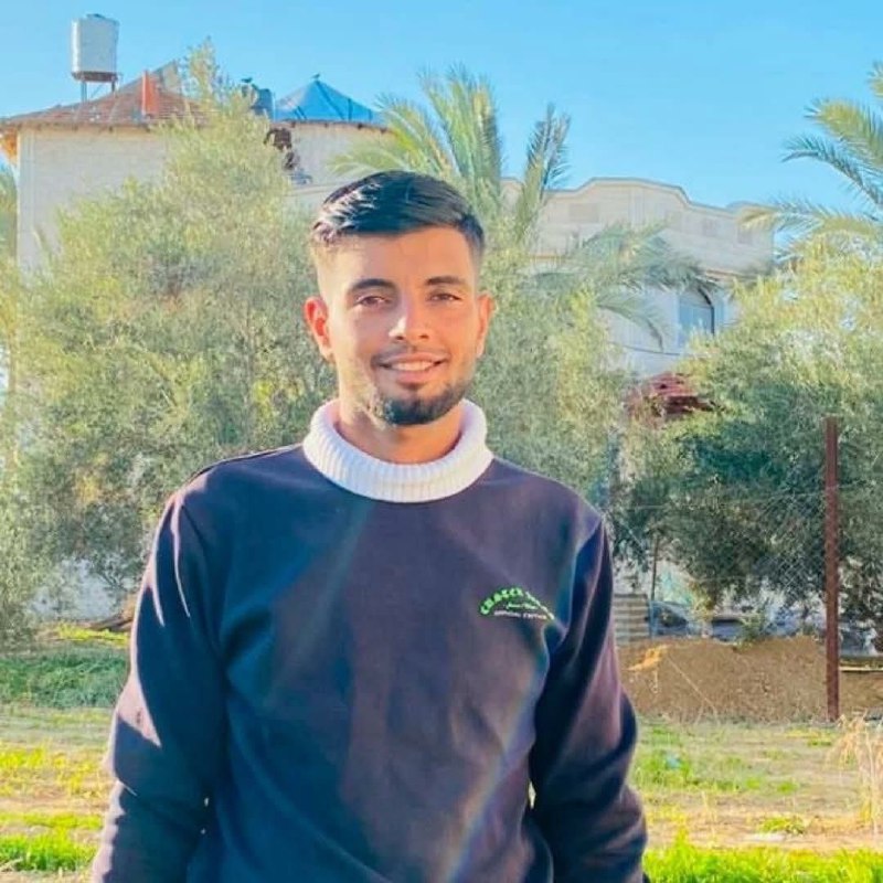 Photo The martyr Anas Fathi Abu Farhana, who was raised by the Israeli army fire in the large town o
