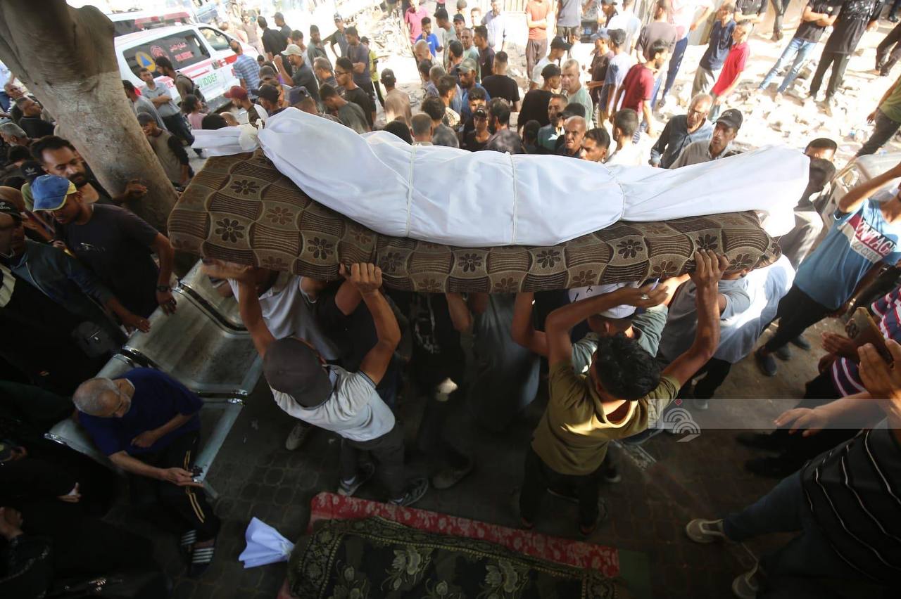 Farewell and the funeral of a number of martyrs, including children in Al -Shifa Medical Hospital, t