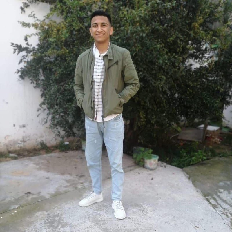 Image of my beloved cousin, the martyr Ibrahim Faraj Mahmoud Al -Masry, who raised just before the b