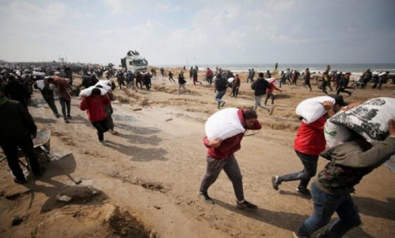 More than 120 between a martyr and a wounded man with a massacre of the occupation against the await