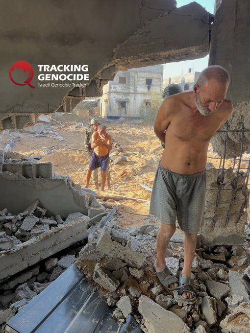 A picture documenting the use of civilians by occupation soldiers, some of them wounded and elderly,