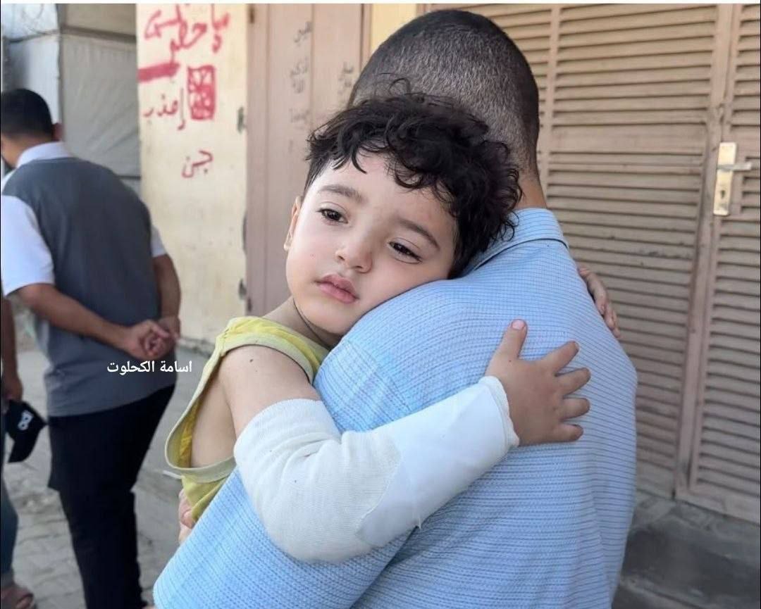 The only survivor...the child "Sami Omar Abu Qasim" survives an Israeli bombing that targeted his fa