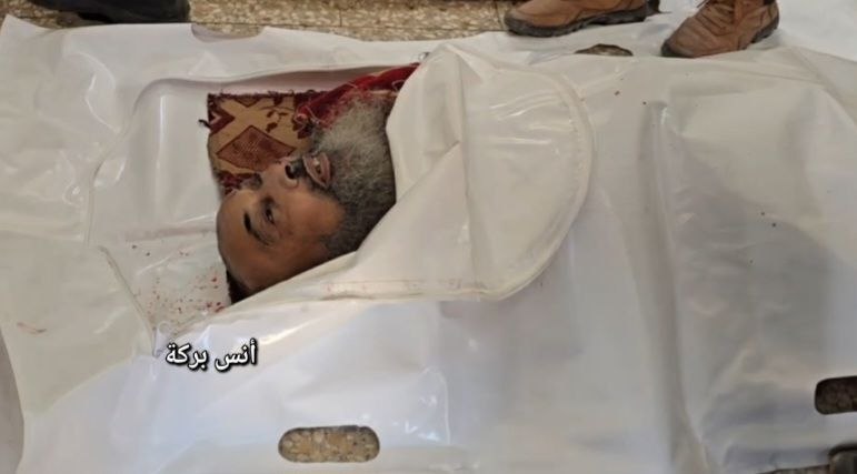 The martyr, the leader of the Hamas movement, Sheikh Kamal Abu Muayliq, after his death with his wif