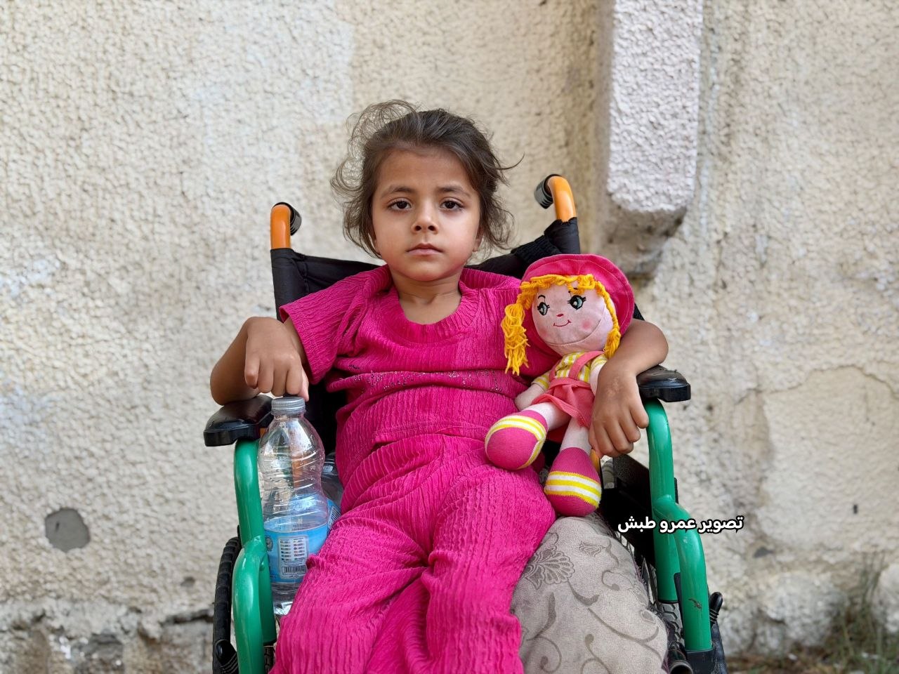 Photos| The child, Reem Al-Sultan, 5 years old, suffers from quadriplegia as a result of shrapnel fr
