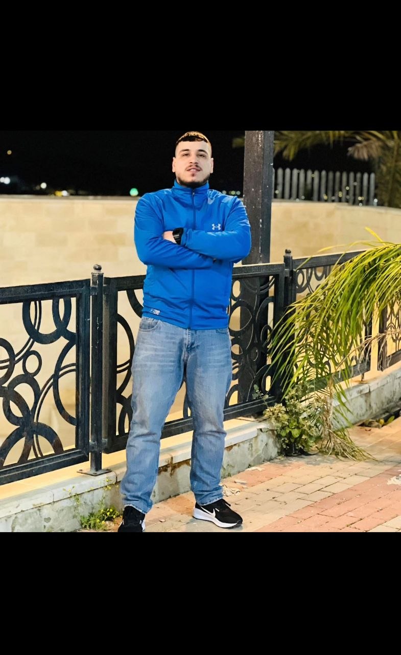 Resistant Basil Turkman rises with the martyr, Commander Qais Al-Bitawi, as a result of the occupati
